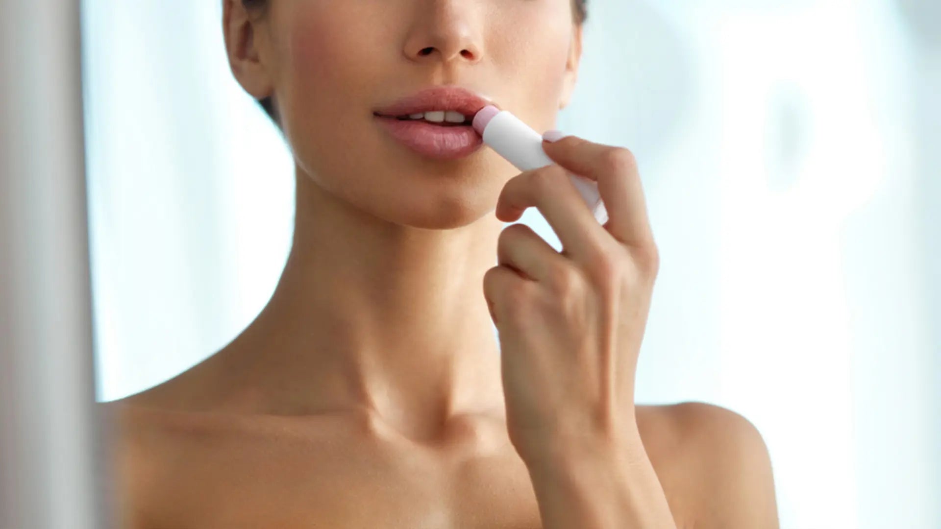 girl applying lip butter