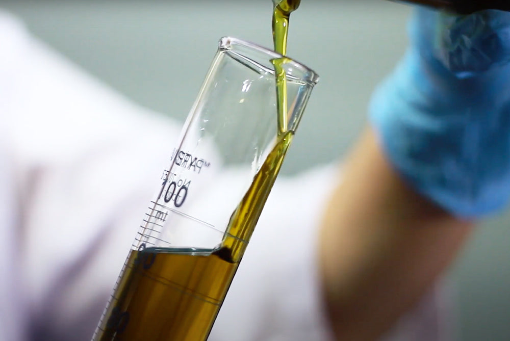 pili oil in test tube